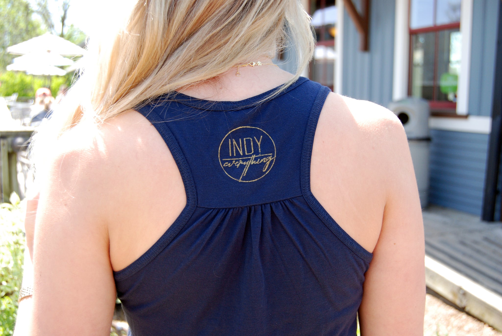 WOMEN'S FLOWY RACERBACK TANK - Indy Over Everything