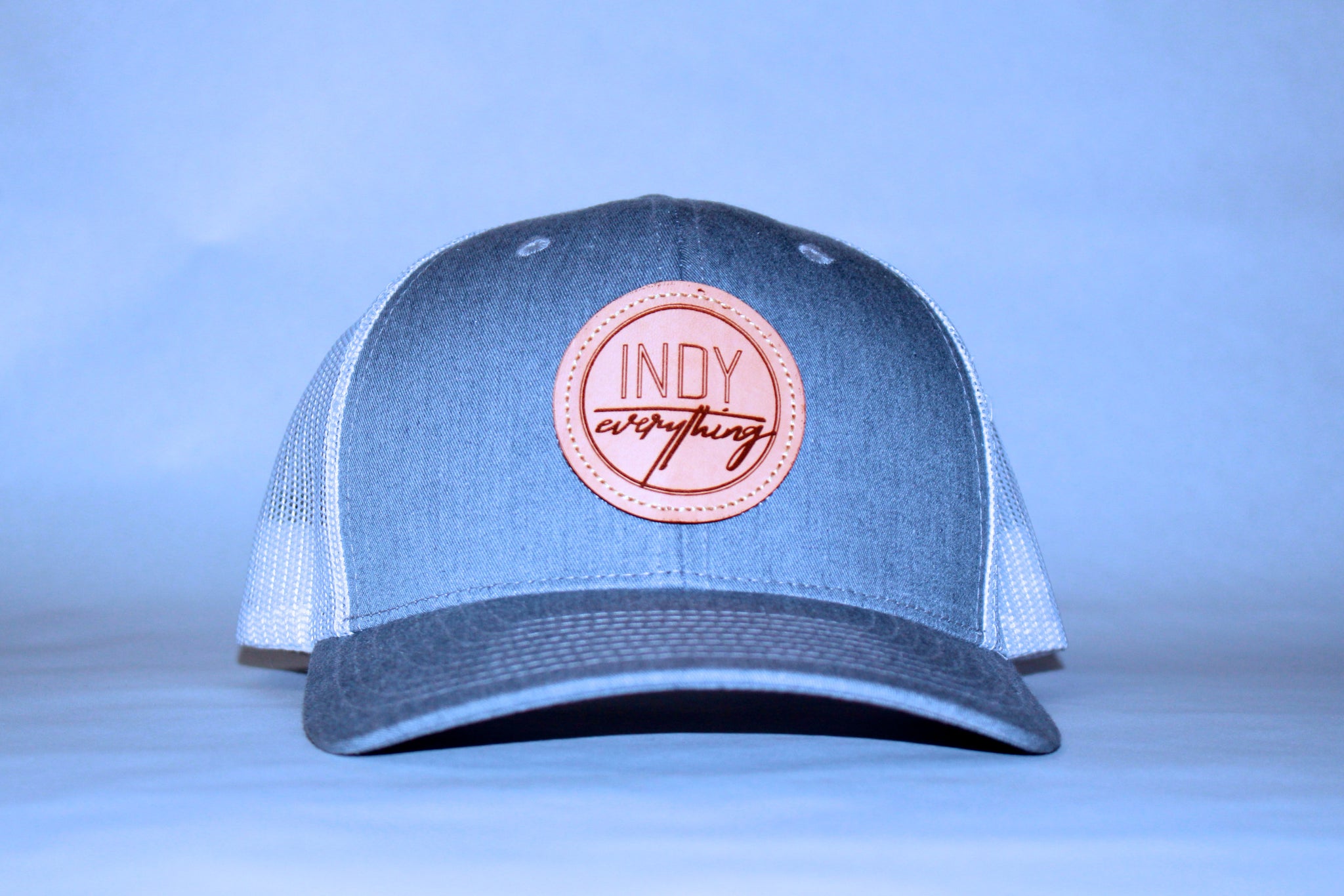 TRUCKER HAT - GRAY AND WHITE W/ LEATHER BADGE - Indy Over Everything